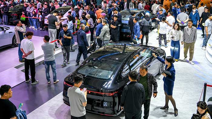 Clean energy vehicles attract attention at an auto show in Tianjin, north China, May 2, 2025. /CFP